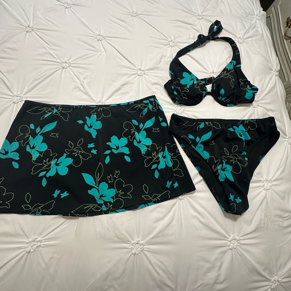 Victoria’s Secret three-piece floral bathing suit.
